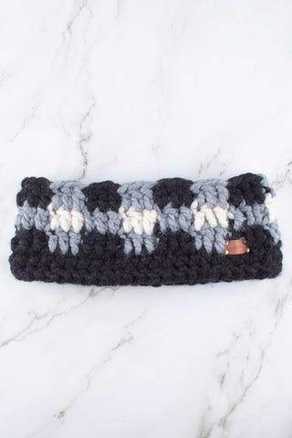 Satin lined winter headband in buffalo plaid. Black, gray, and white.