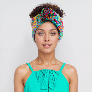 Woman with natural hair wearing a satin lined headband in Azure.